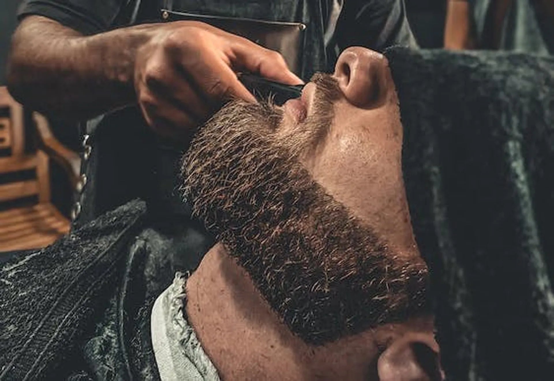 Man being shaved barber