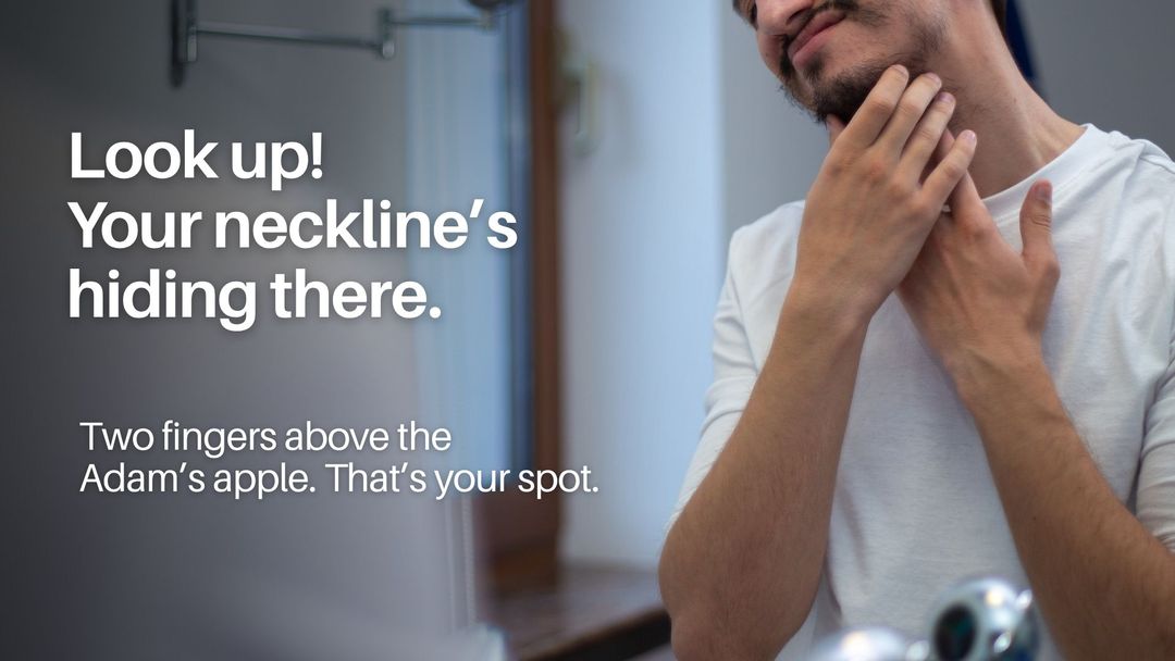 Man tilting head back to identify beard neckline