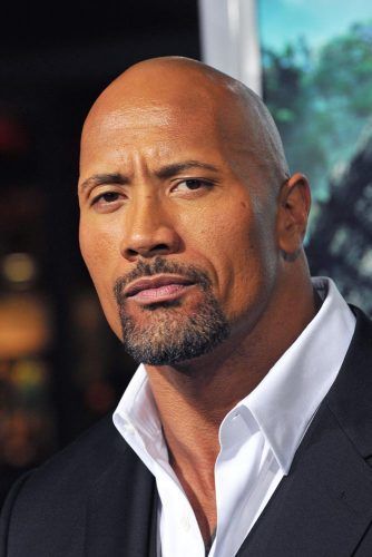 A compact goatee style with a mustache and connected chin beard