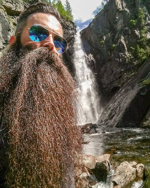 A massive, flowing beard extending downward like a waterfall